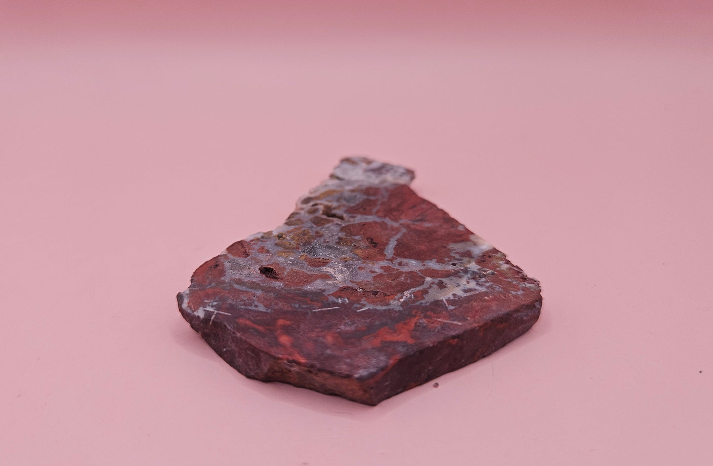 38 gram Hatch NM rhyolite slab with bold red, tan, and gray brecciated patterns and natural matrix textures – ideal for lapidary, crafting, or display