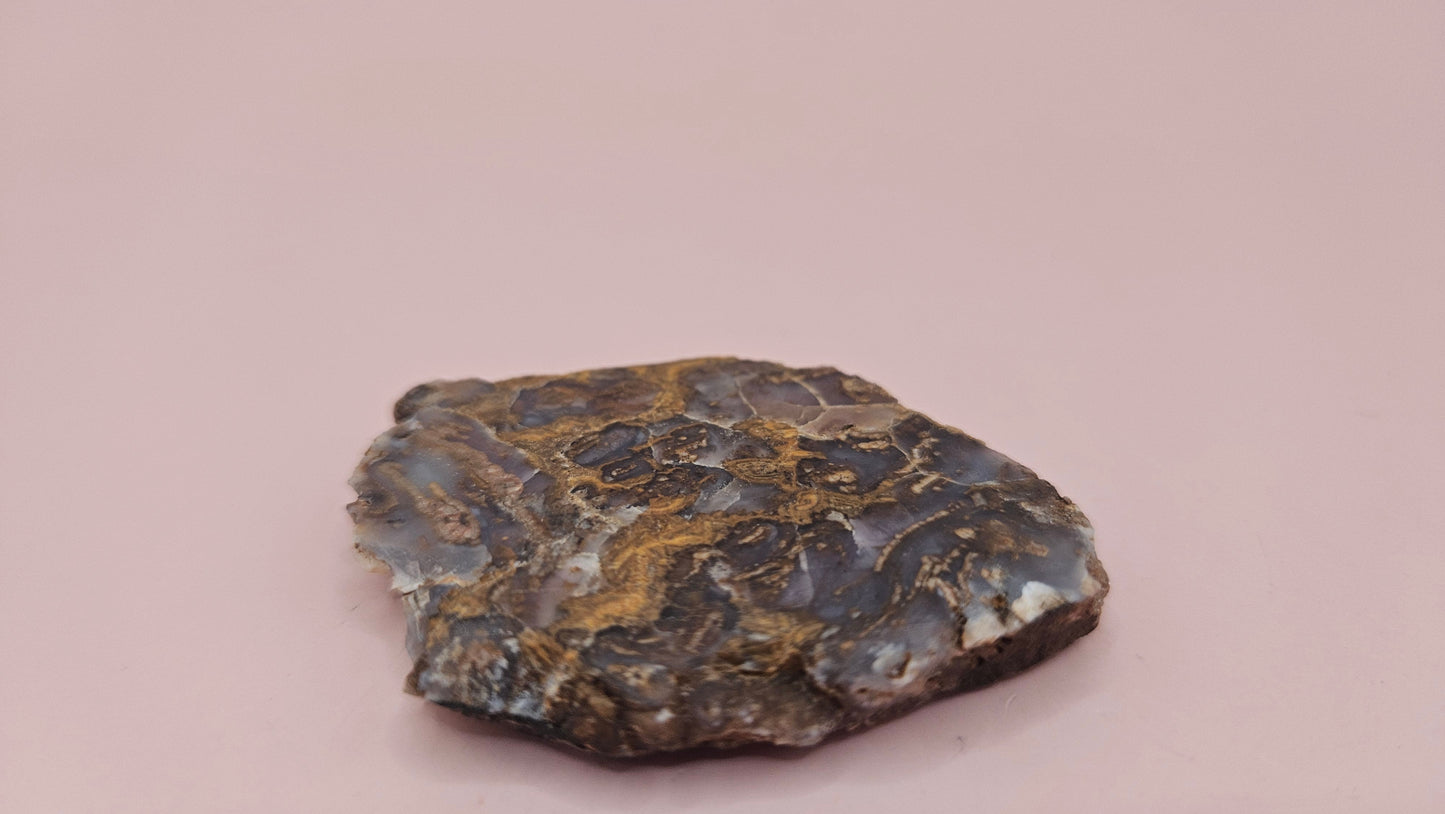 23g Moss Agate slab with smoky lavender tones and golden mossy veins, 2.1x1.7 inch specimen held in hand.