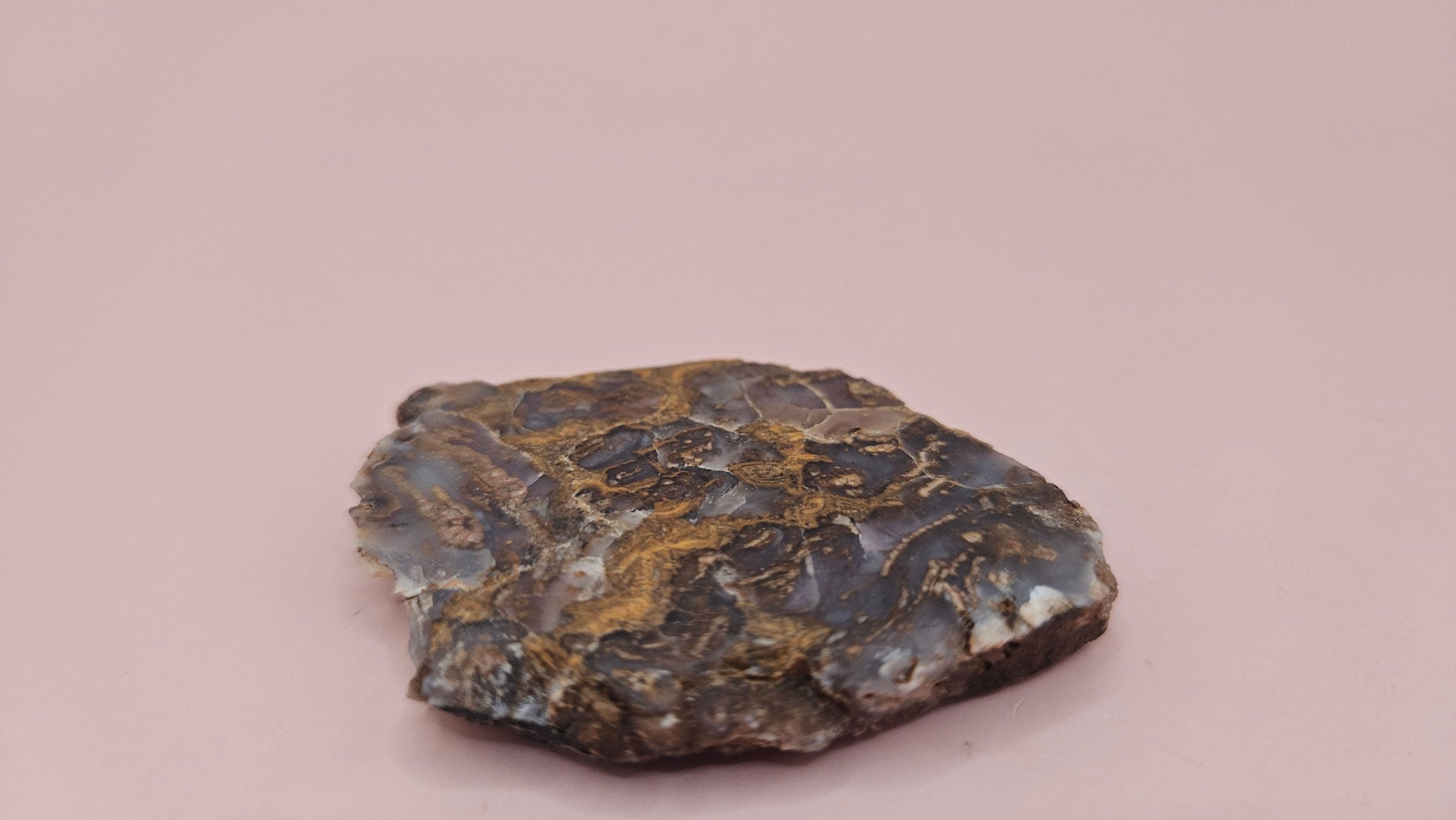 23g Moss Agate slab with smoky lavender tones and golden mossy veins, 2.1x1.7 inch specimen held in hand.