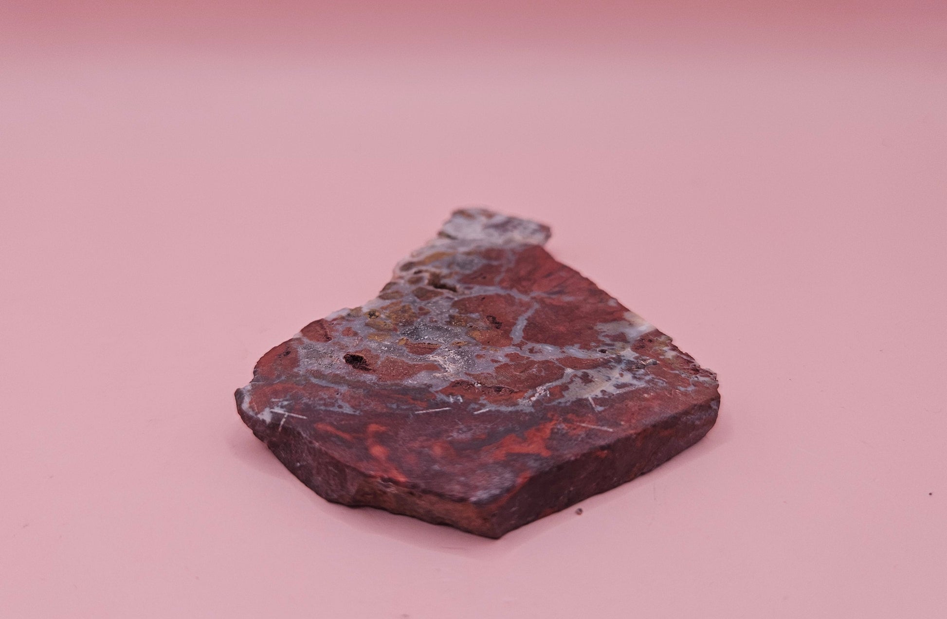 38 gram Hatch NM rhyolite slab with bold red, tan, and gray brecciated patterns and natural matrix textures – ideal for lapidary, crafting, or display