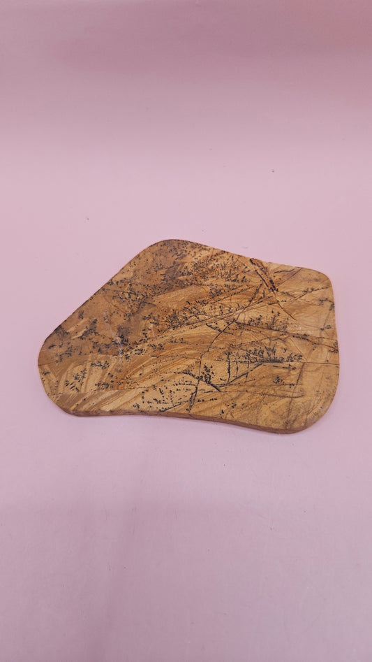 Polished Yellow Feather Jasper slab with black dendritic inclusions on a golden yellow base, 50 grams.