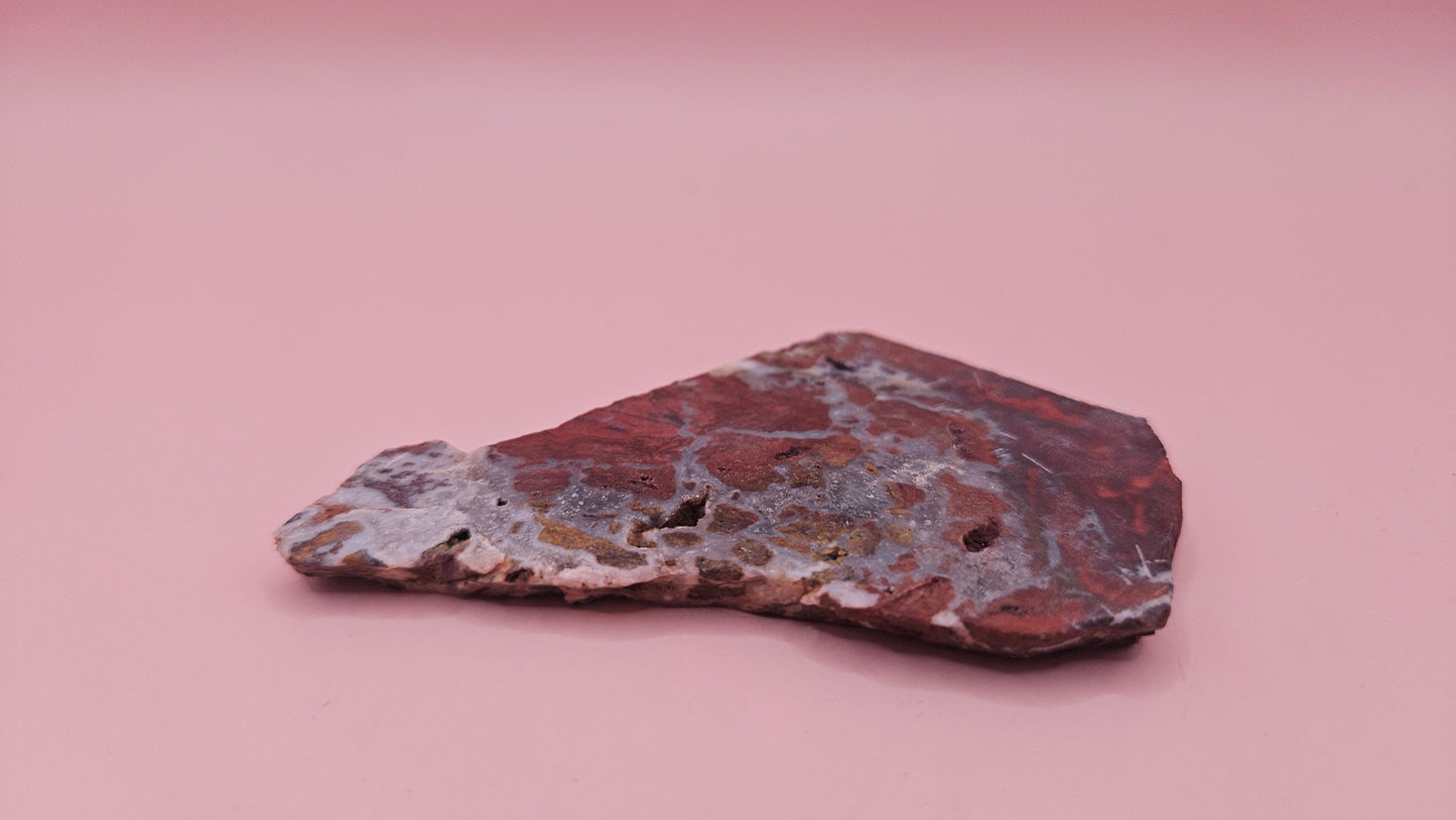 38 gram Hatch NM rhyolite slab with bold red, tan, and gray brecciated patterns and natural matrix textures – ideal for lapidary, crafting, or display