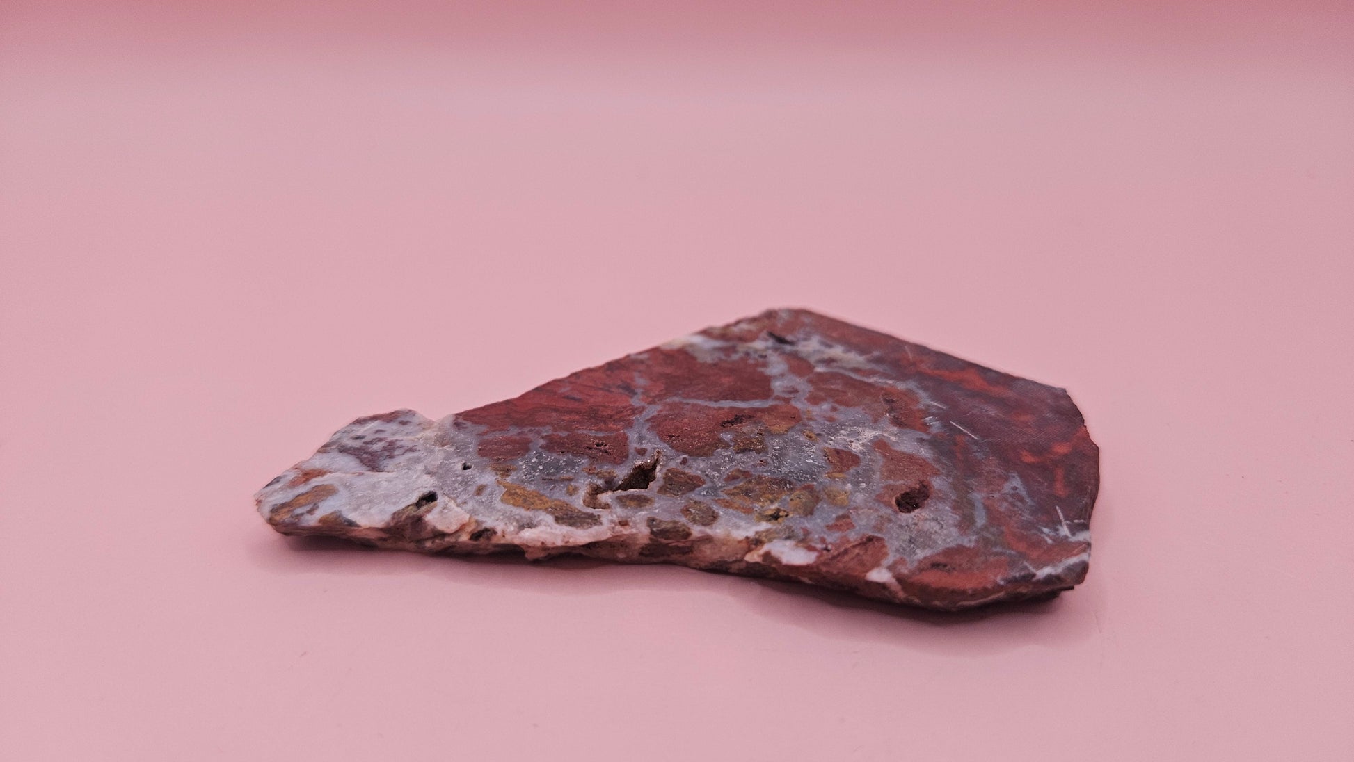 38 gram Hatch NM rhyolite slab with bold red, tan, and gray brecciated patterns and natural matrix textures – ideal for lapidary, crafting, or display