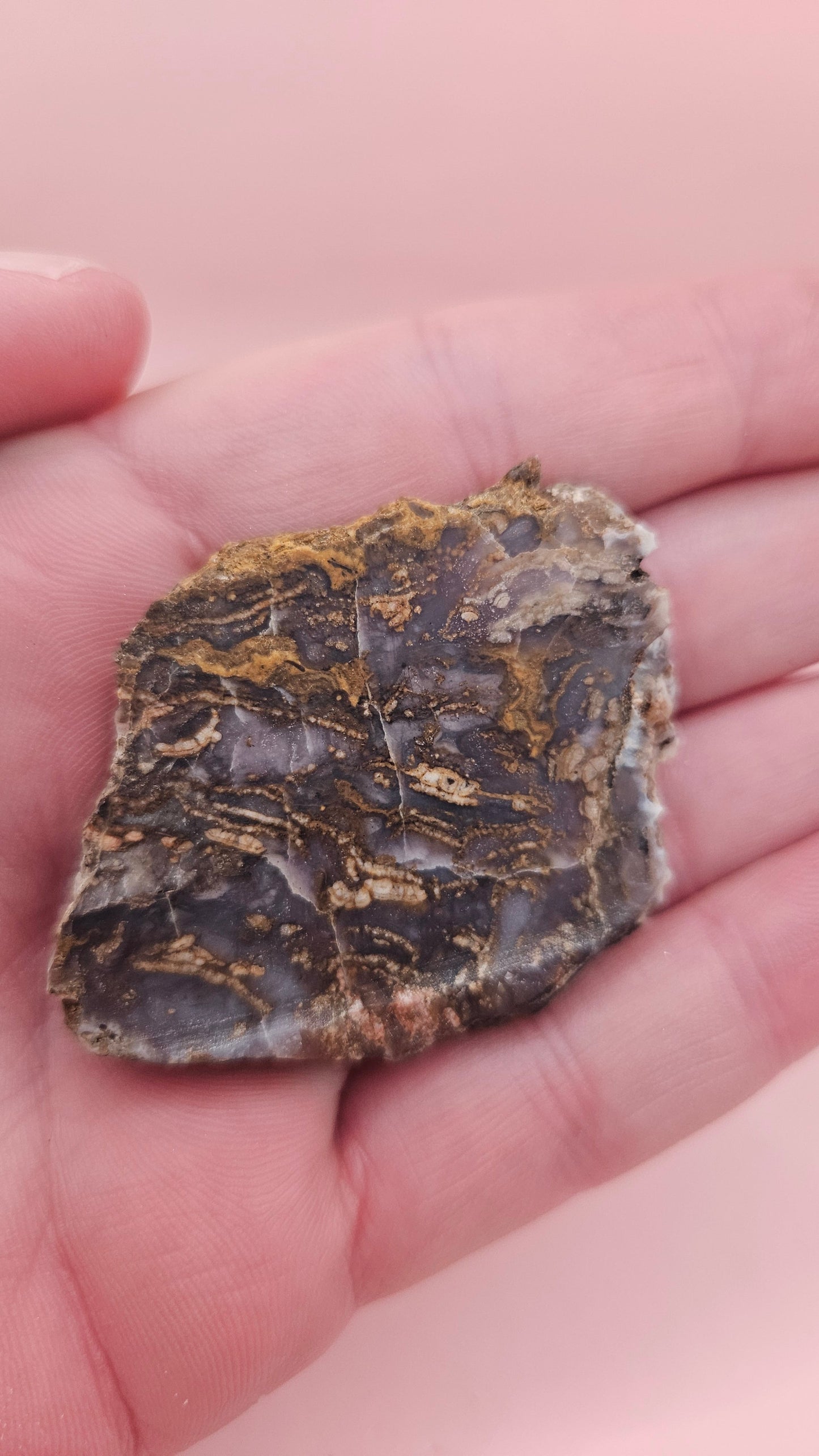 23g Moss Agate slab with smoky lavender tones and golden mossy veins, 2.1x1.7 inch specimen held in hand.