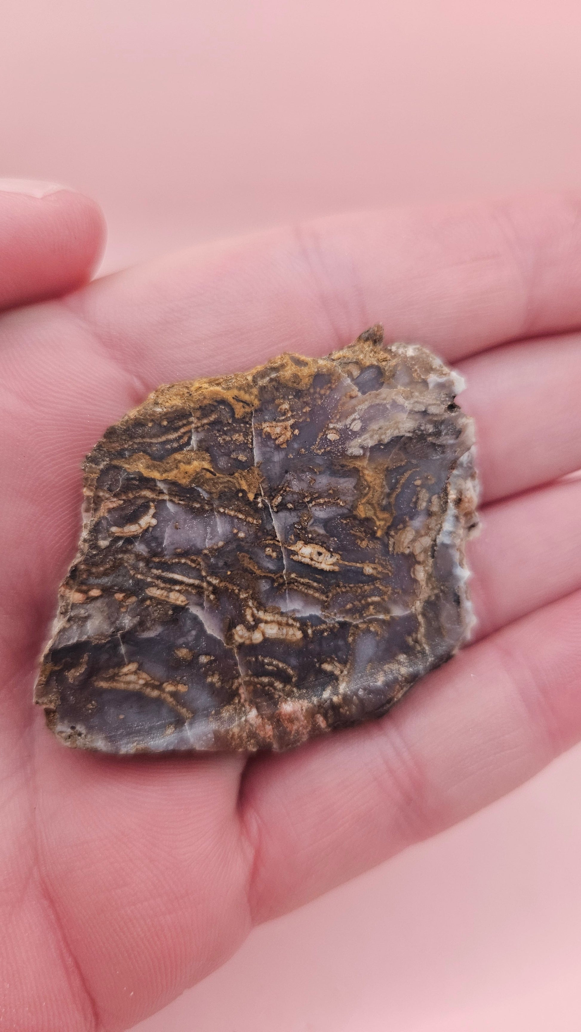 23g Moss Agate slab with smoky lavender tones and golden mossy veins, 2.1x1.7 inch specimen held in hand.
