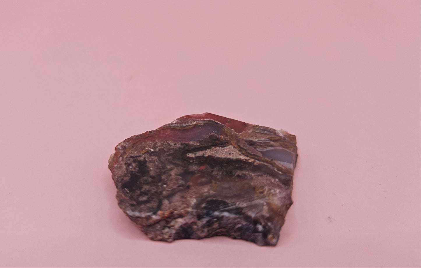 11g Moss Agate slab with taupe and lavender tones and root-like veining, 1.3x1.2 inches, displayed in hand.